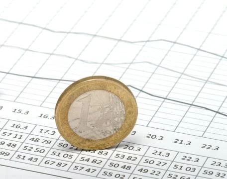 Coin on the table. Stock Photos