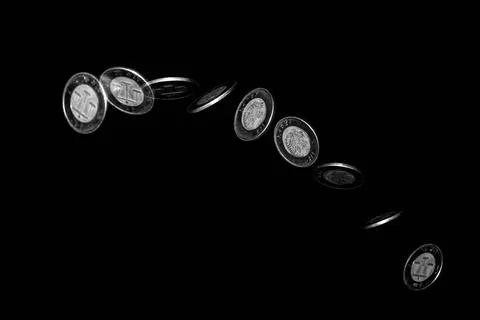 Coin toss Stroboscopic effect created using flash capturing the motion of ... Stock Photos