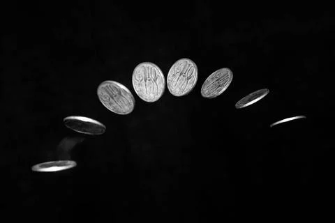 Coin toss Stroboscopic effect created using flash capturing the motion of ... Stock Photos