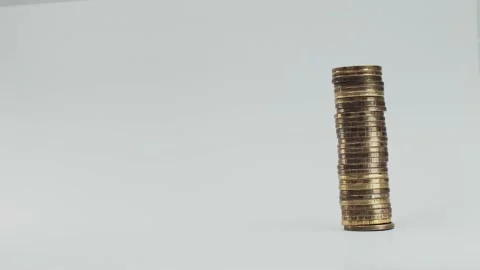 The coin tower is falling in stop motion Video stock 186621158