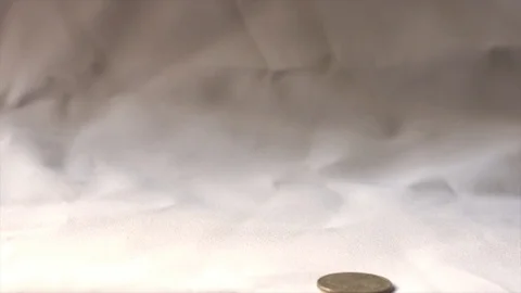 Coin on white background slow motion concept video. Stock-Footage 106236583