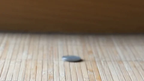Coin on white background slow motion concept video. Stock Footage 106236657