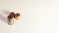Coin on white background - stop motion HD Footage