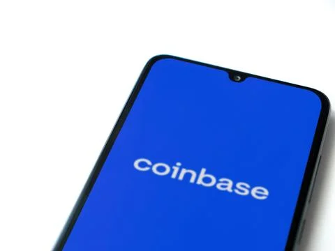 Coinbase app launch screen on smartphone on white background Stock Photos