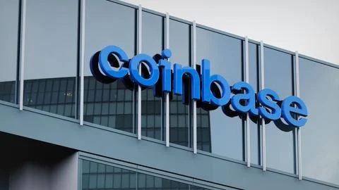 Coinbase Stock data presented on the logo of the office facade editorial Stock Photos