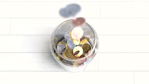 Coins are falling inside the glass jar, Saving money concept, Bank deposit Stock Footage 189740994