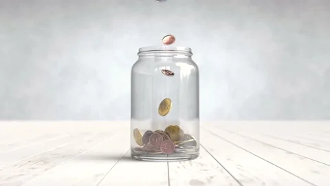 Coins are falling inside the glass jar, Saving money concept, Bank deposit Video stock 189740995