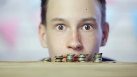 The coins are on the table stacked in a tower. Close up Stock Footage 109159678