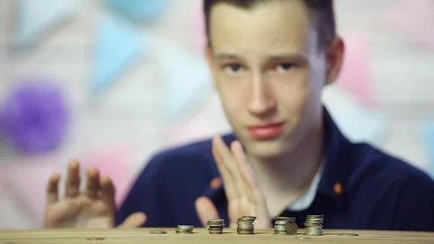 The coins are on the table stacked in a tower. Close up Stock Footage 109159688
