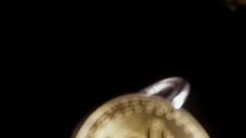 Coins on a black background are falling down and sparkling slow mo Stock Footage 85472445