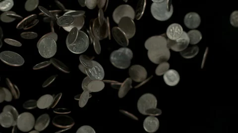 Coins on black flying towards camera Video stock 249559387