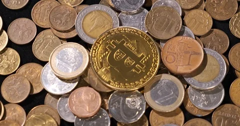 Coins in bulk lie on rotating surface, coins from Europe and Asia, rubles, euros Stock Footage 120894990
