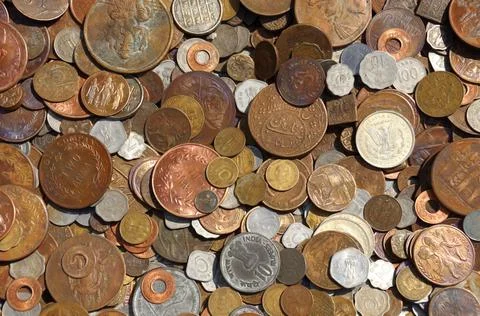 Coins of different countries Background. Stock Photos