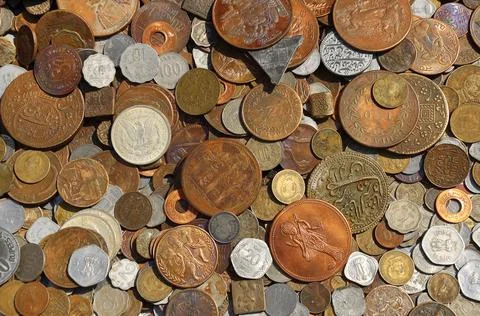 Coins of different countries Background. Stock Photos
