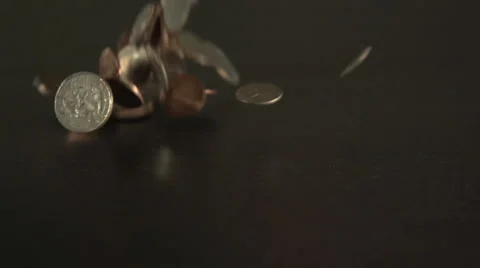 Coins drop and fill a table. Stock Footage 44104831