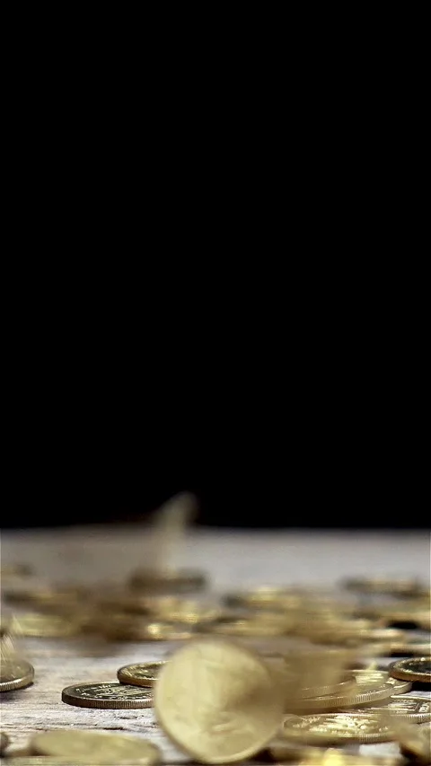 Coins fall and bounce off the surface Stock Footage 339233382