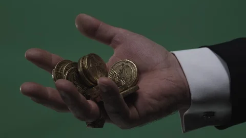 Coins fall into your hand Stock-Footage 112123332