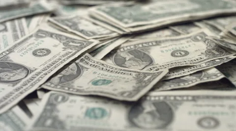 Coins falling on dollar bills, slow motion Stock-Footage 62279296