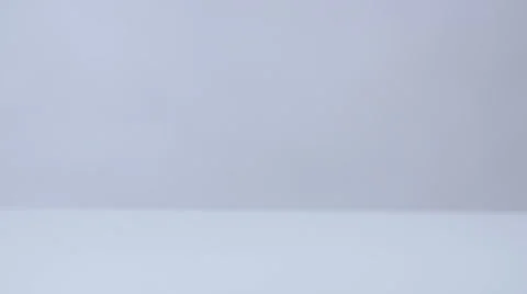 Coins falling, dropping on white surface in slow motion Stock Footage 58761272