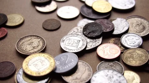 Coins falling in slow motion Stock Footage 86194523