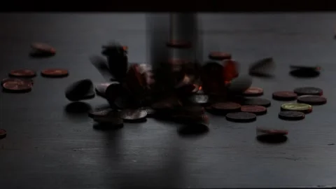 Coins falling on a table 4K Video stock 147460437