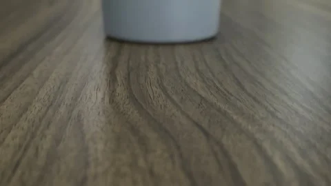 Coins Falling onto Table Close-Up - Money Finance Concept Stock Footage 303022500