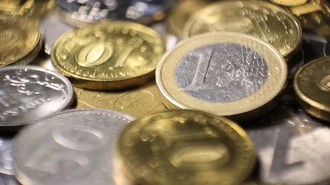 Coins Falling From The Top Down.  Macro Stock Footage 70874731