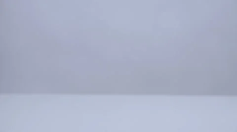 Coins falling on white surface slow motion Stock Footage 58761265