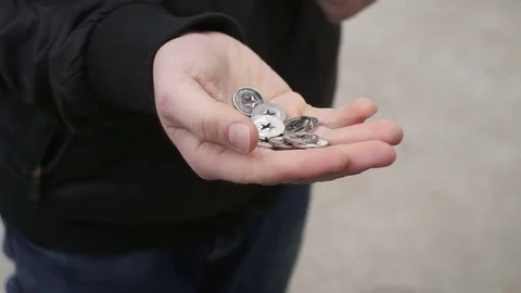 Coins in hand Stock Footage 73594985