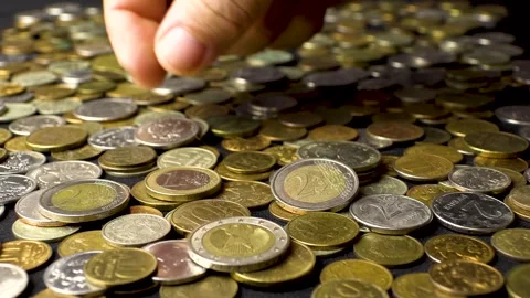  coins in hand 動画素材 276650927