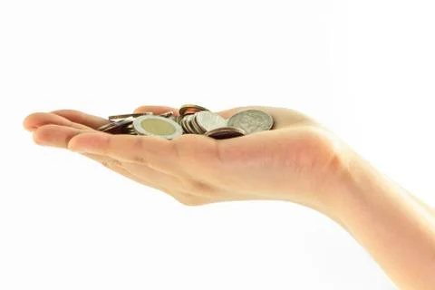 Coins on hand isolate Stock-Fotos