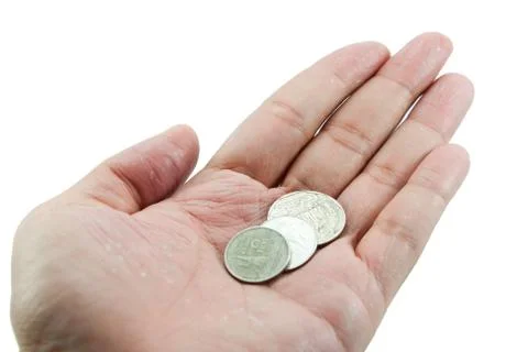 Coins on hand Stock Photos