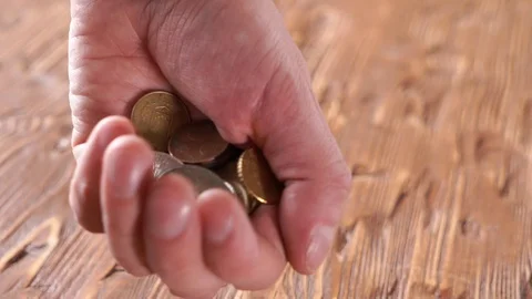 Coins in hands. saving money concept. Stock Footage 107789982