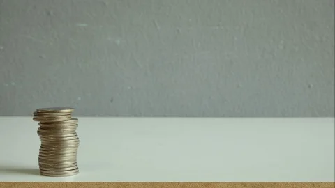Coins increase and decrease in stop motion seen. 库存影片 128096492