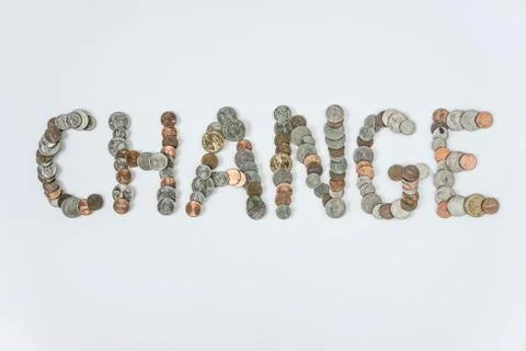 Coins isolated on solid white background spelling the word Change Stock Photos