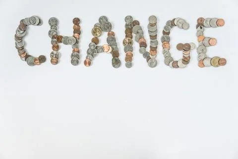 Coins isolated on solid white background spelling the word Change Stock Photos