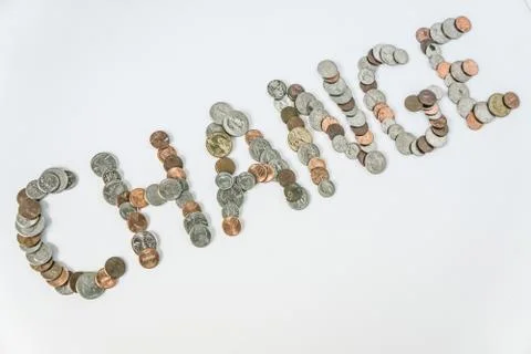 Coins isolated on solid white background spelling the word Change Stock Photos