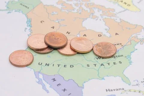 Coins on map American Stock Photos