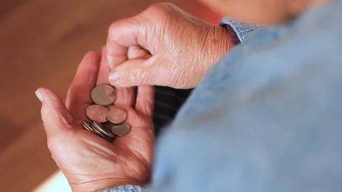 Coins in old granny hands close up. Poverty, Coins in hands close-up Video stock 117497713