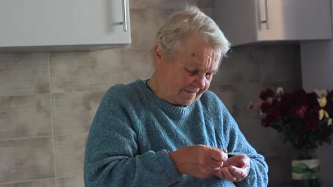 Coins in old granny hands close up. Poverty, Coins in hands close-up Video stock 141207258