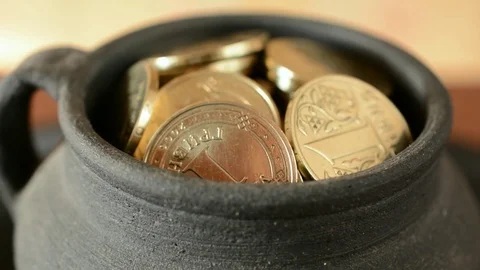 Coins in pot Video stock 74885242