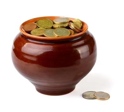 Coins in pot Stock Photos