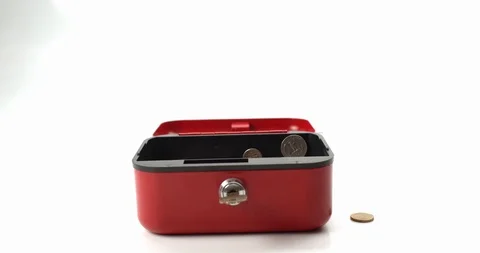 Coins raining down from above into empty cashtin Stock Footage 111958831