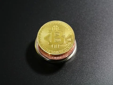 Coins Representing Crypto on Black Background Stock Photos
