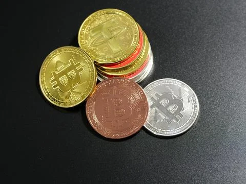 Coins Representing Crypto on Black Background Stock Photos