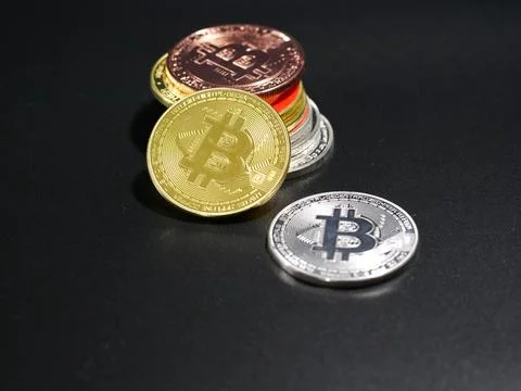 Coins Representing Crypto on Black Background Stock Photos