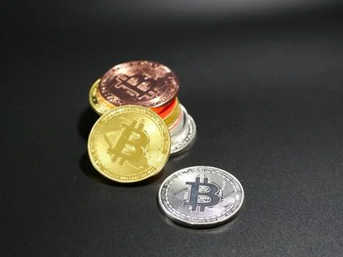 Coins Representing Crypto on Black Background Stock Photos