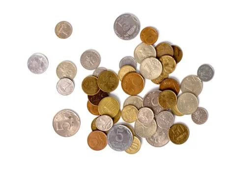 Coins scattered on white background Stock Photos