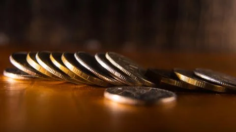 Coins on a silver background, close-up, macro, space for text, background, po Stock Photos