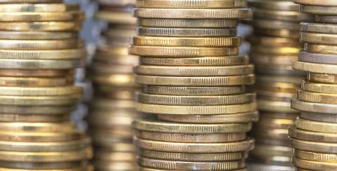 Coins sorted by height Stock Photos